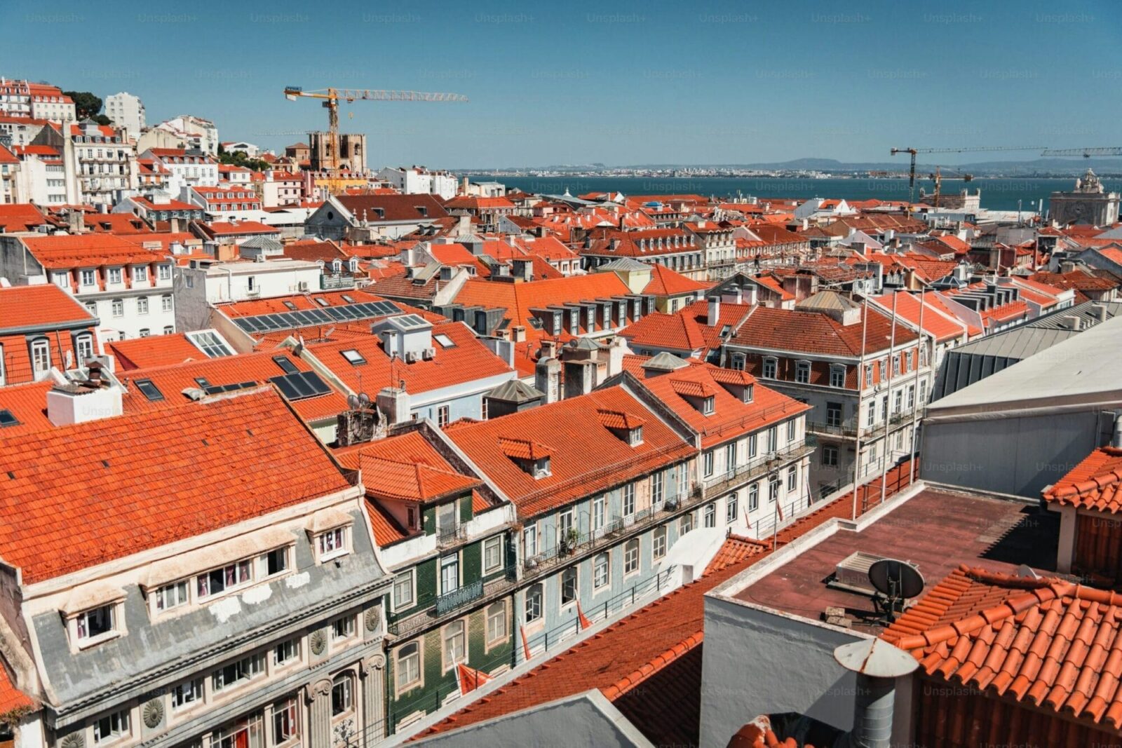 Lisbon red rooftops and Tagus River panorama