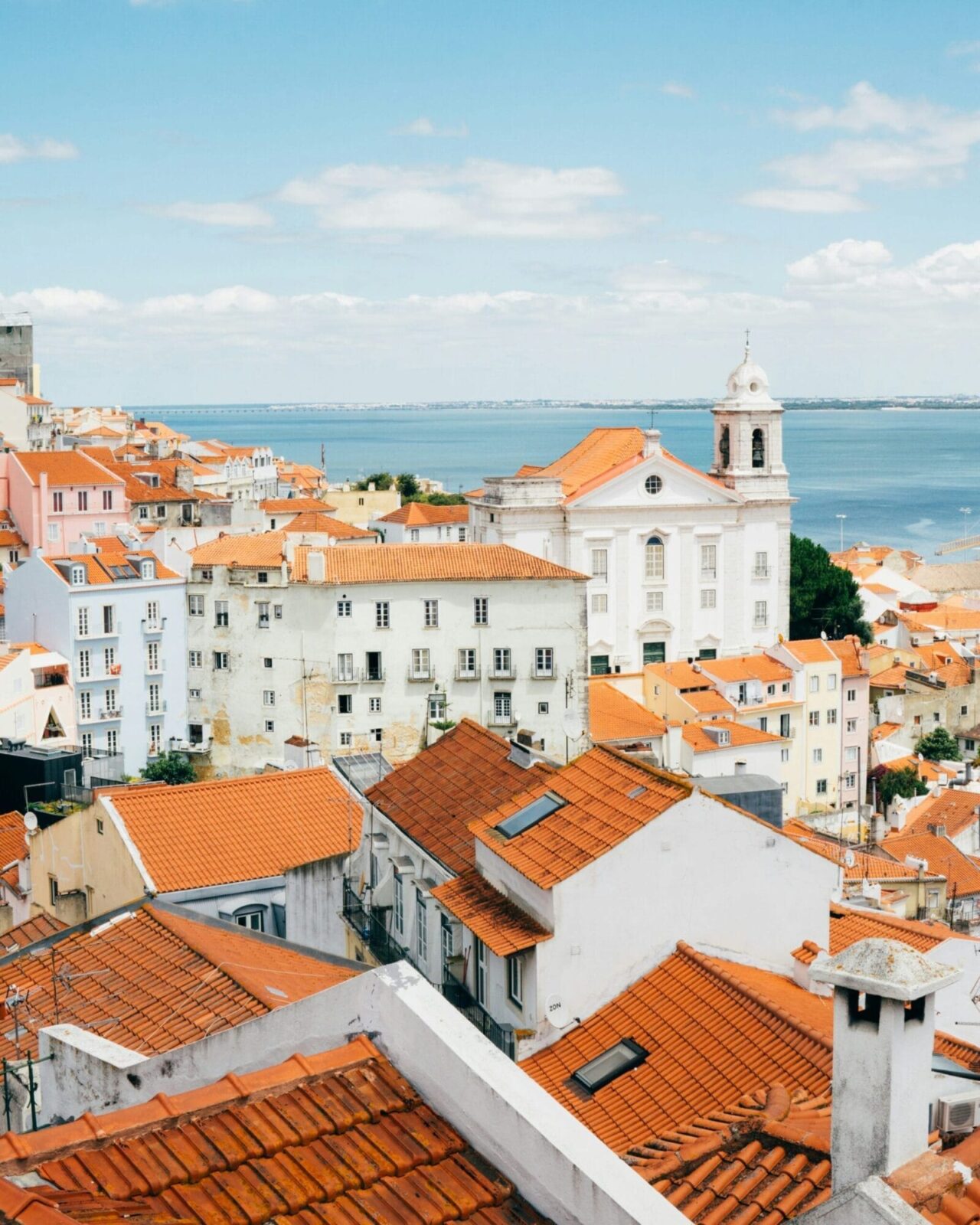 Alfama neighbourhood viewpoint with terracotta rooftops