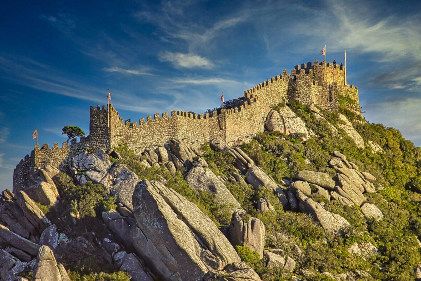 Ancient Moorish Castle walls winding through the Sintra hills